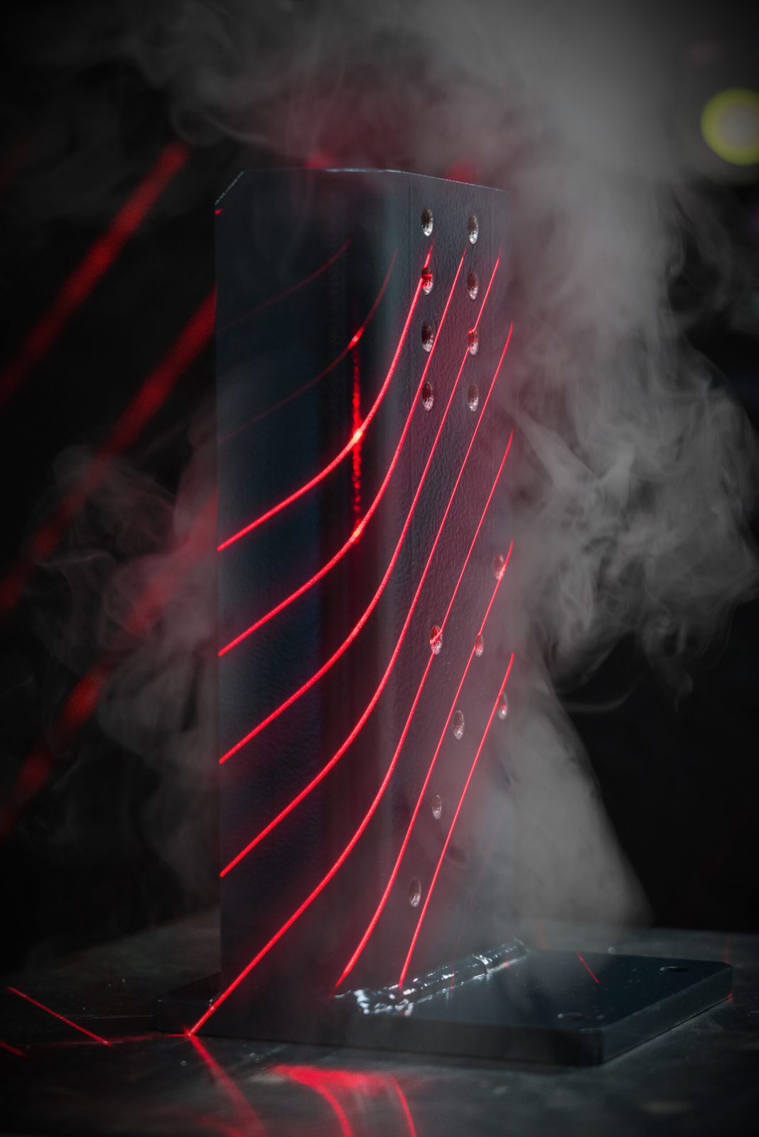 Laser 3D scanning: red laser lines on a sheet metal part