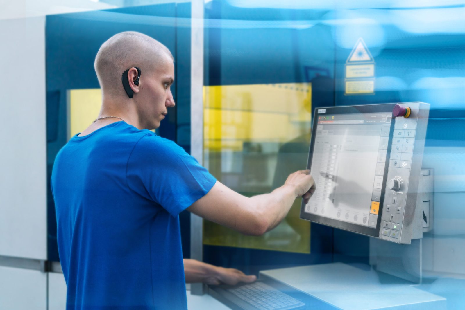 Operator at the CNC control panel
