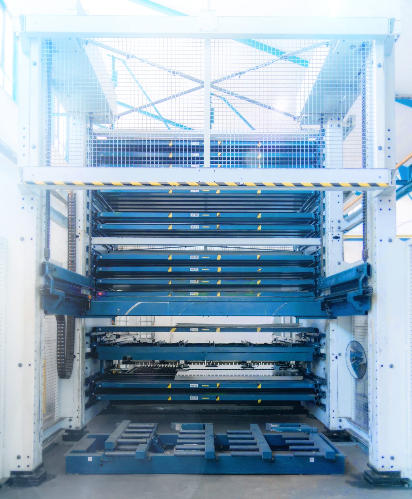 Automated sheet metal storage tower with drawer shelves