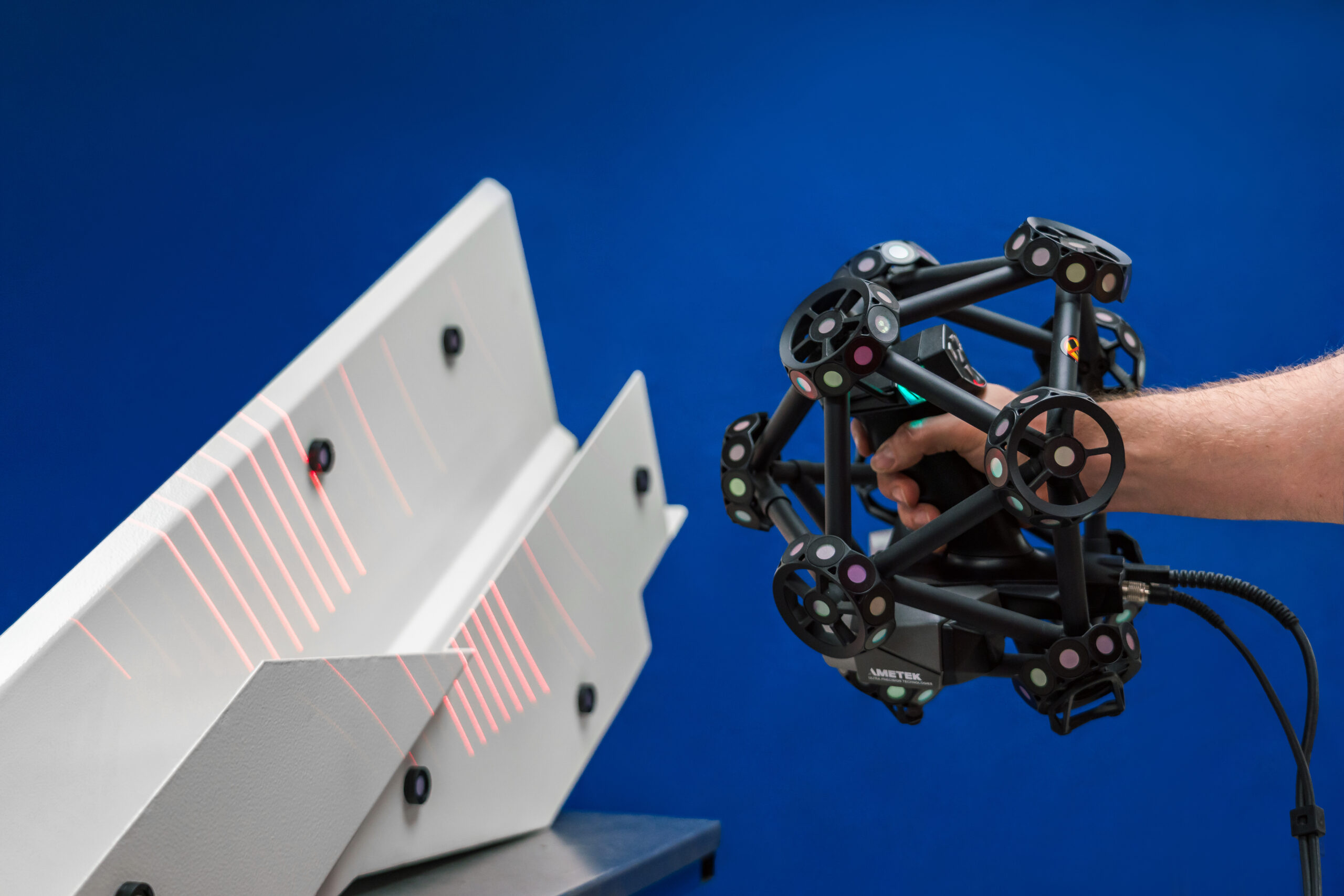 Creaform handheld 3D scanner during measurement