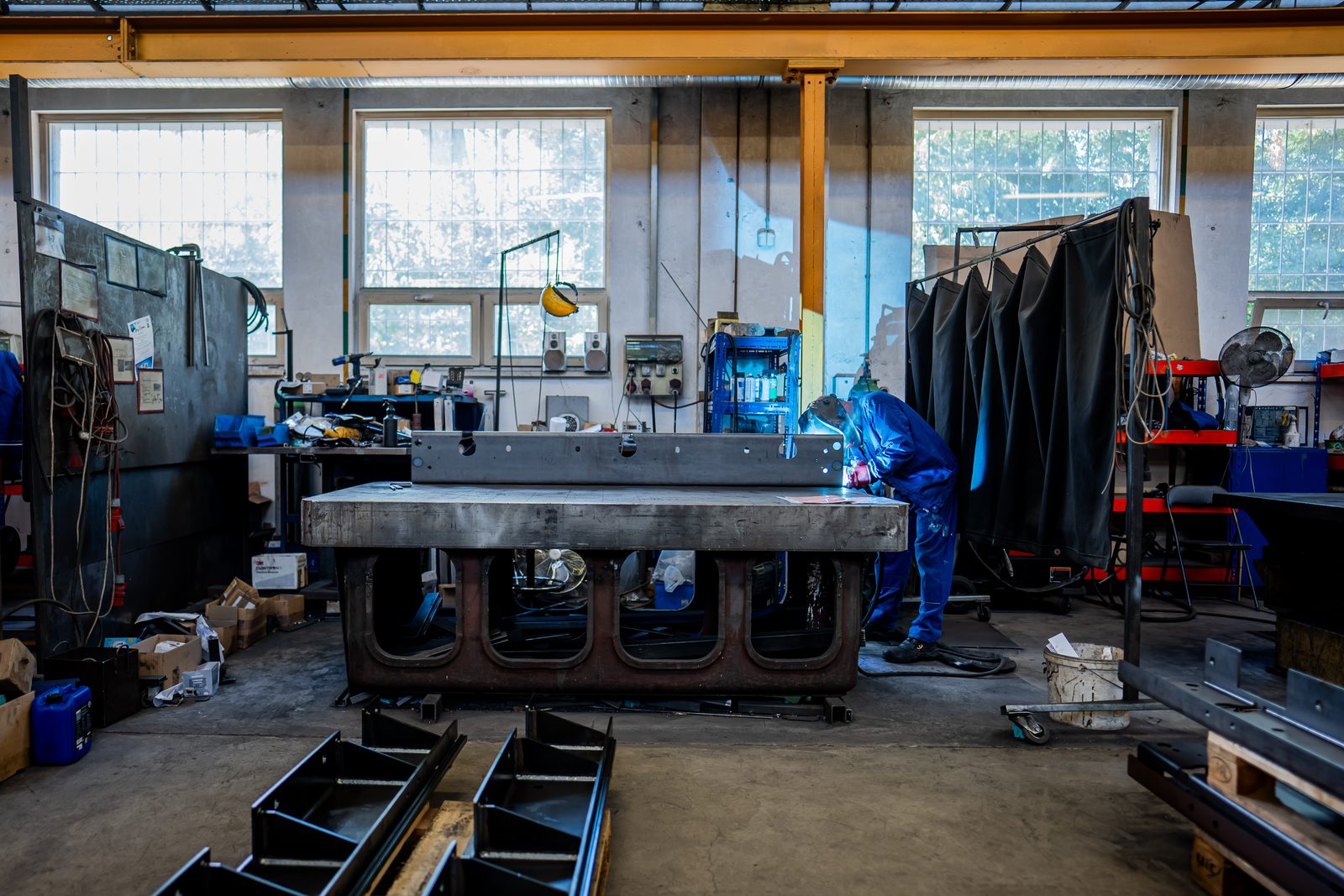 Welding a large steel structure in the fabrication shop